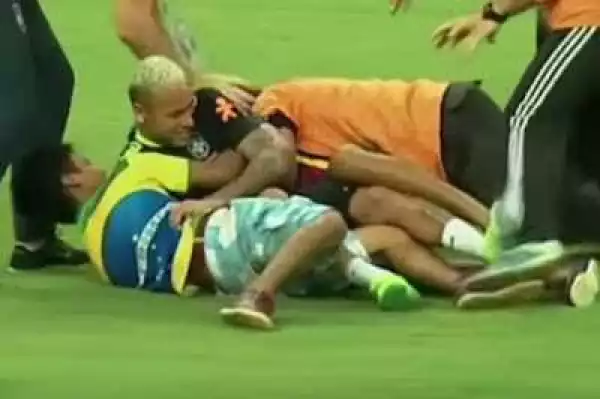 Neymar Tackled To The Ground By Pitch Invaders During Brazil